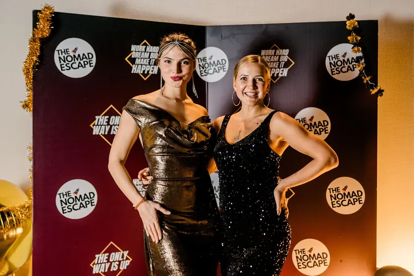 Guests in gold and black gowns at the V-Gala