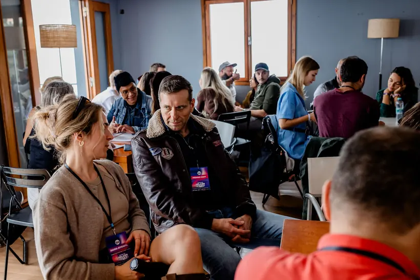 Founders working through a strategy exercise around a table