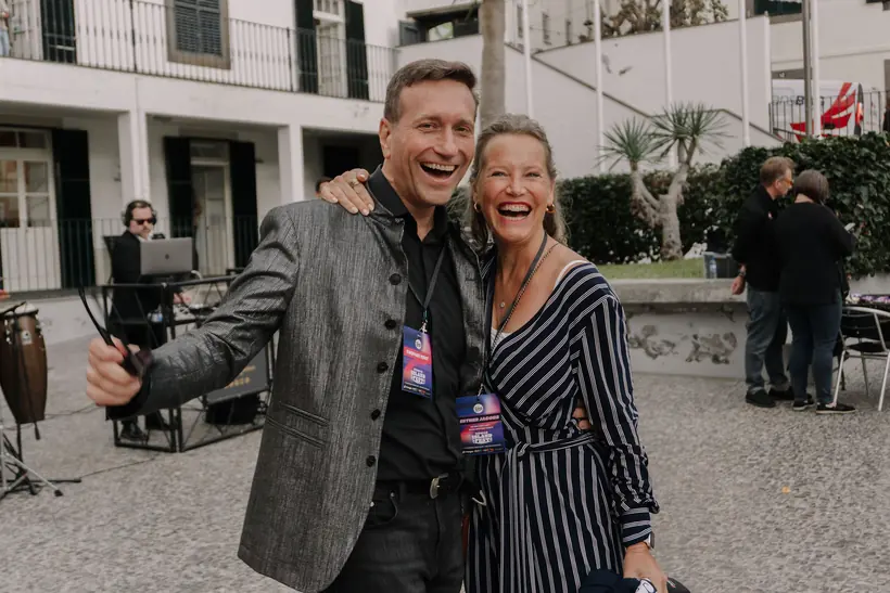 Two founders laughing on the red carpet